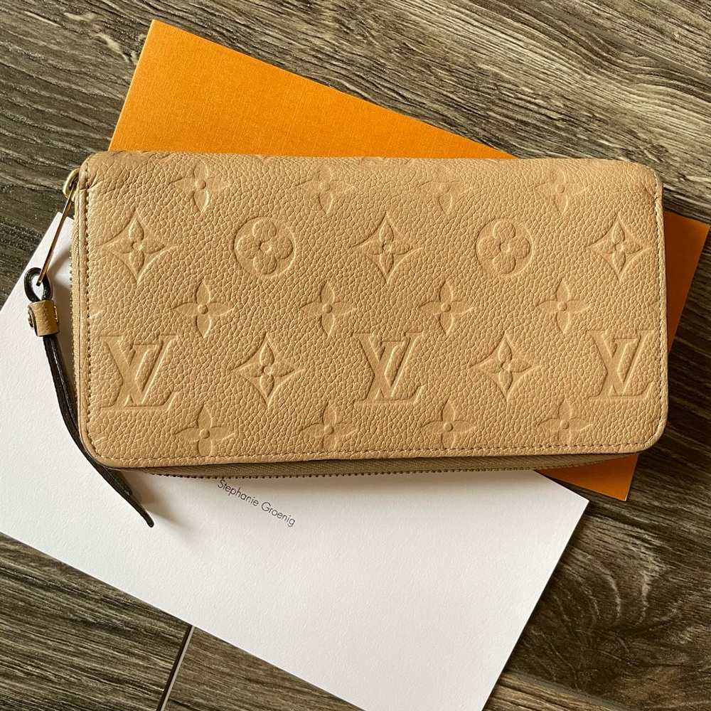Authentic Louis Vuitton Beige Monogram Empreinte Zippy Wallet  NM